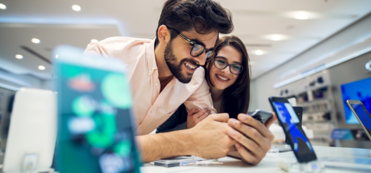 Two People In Store Looking For New Phone